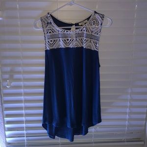 a navy blue and white tank top